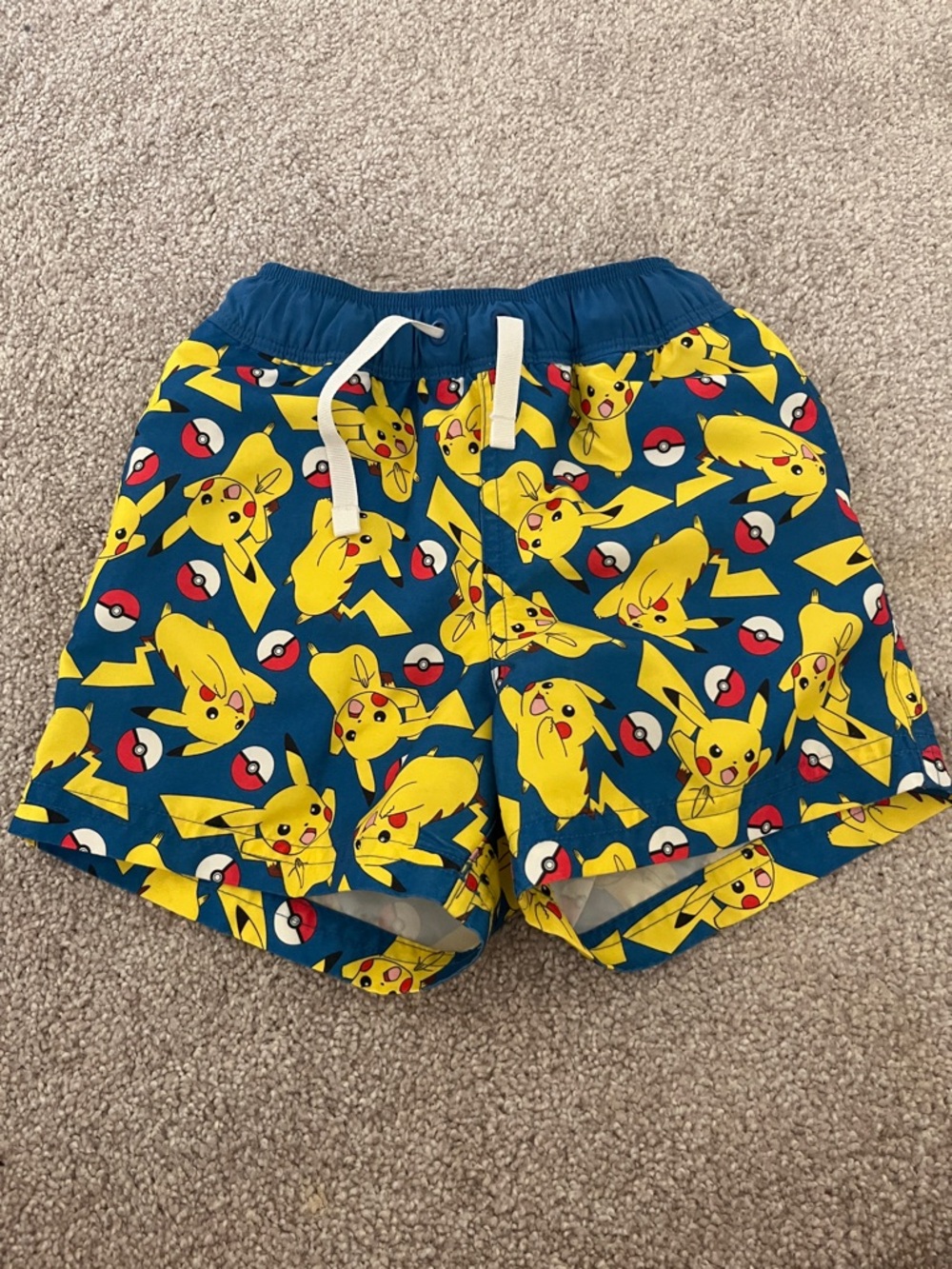 Hanna Andersson Pikachu Print Blue and Yellow Kids Swim Shorts